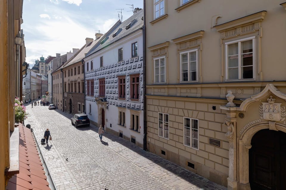 A charming street view with cobblestone roads and classic architecture, capturing the historic character of the area.

