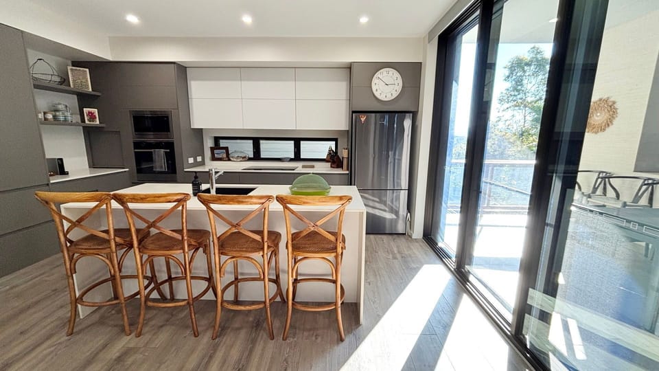 Kitchen and outdoor dining area.