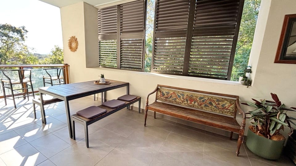Private balcony and outdoor dining area.