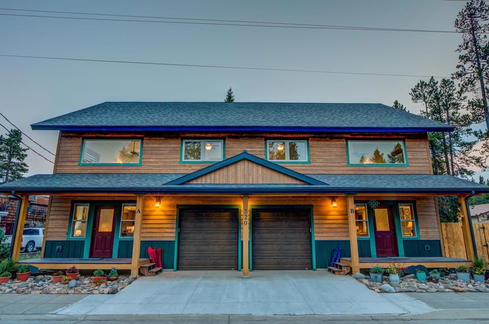 Exterior with porch and parking space on the right side of house