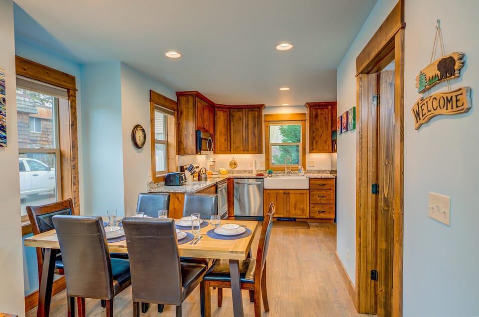 A view of the dining room leading into the kitchen