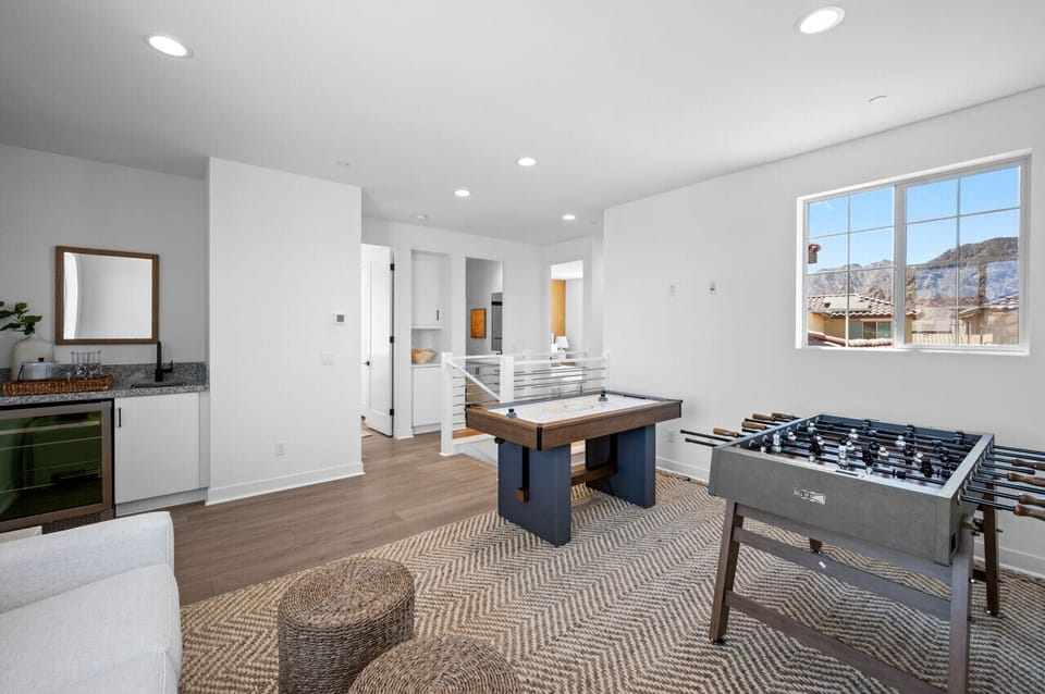 Open game area w/ ping pong table & nearby kitchen space for casual hangouts