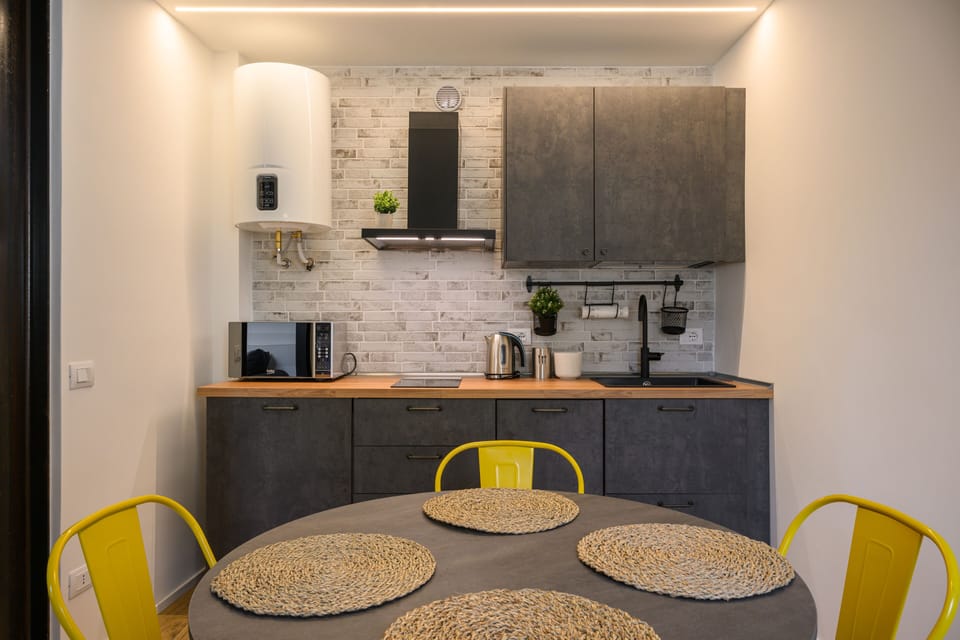 Comfort Apartment | Private kitchen | Full-size fridge, microwave, stovetop, dishwasher