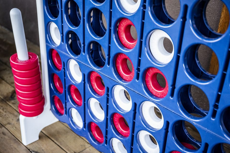 Challenge your friends to a fun game of giant Connect Four on the deck!