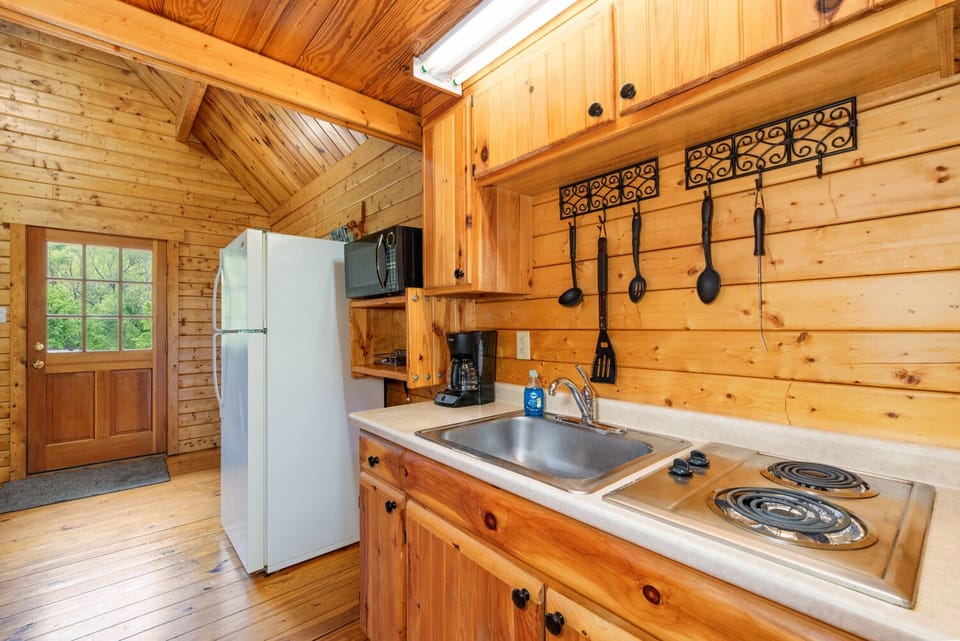 kitchenette with all the pots, pans and dishes you will need