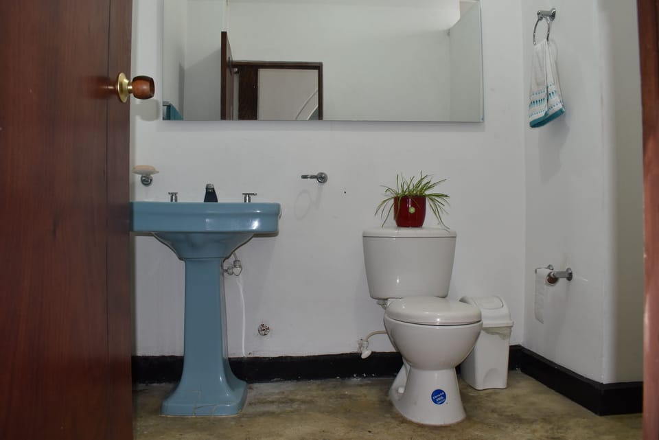 Basic Single Room, 1 Bedroom | Bathroom | Soap, toilet paper