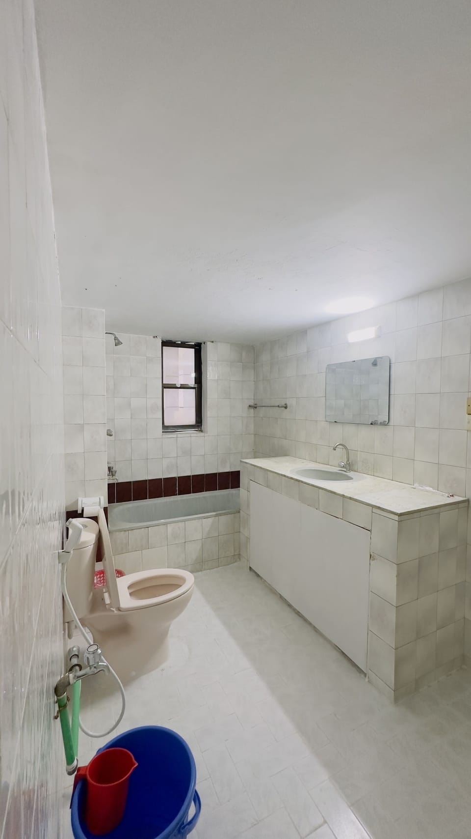 Shower, rainfall showerhead, slippers, towels