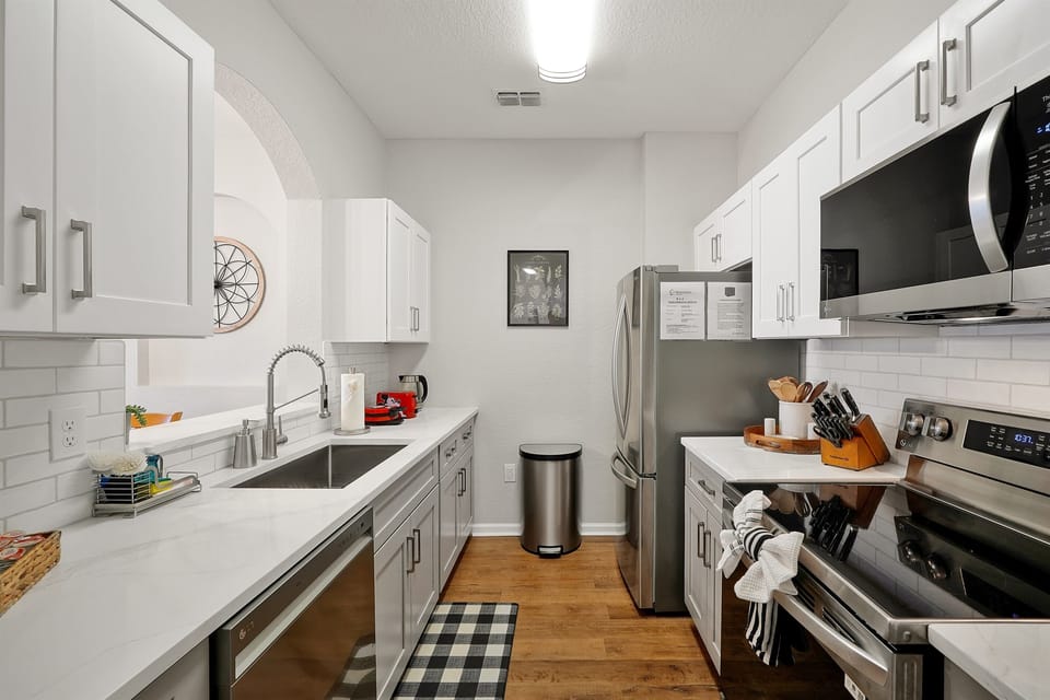 New appliances, cabinets, and quartz countertops!