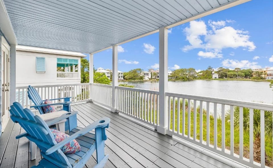 Relax on your private covered deck with stunning water views, complete with comfortable seating for peaceful morning coffee or sunset cocktails.