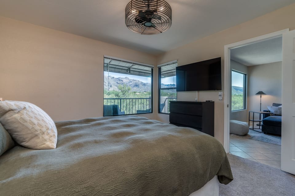 Primary bedroom with Mountain Views and portable work desk (not shown here).