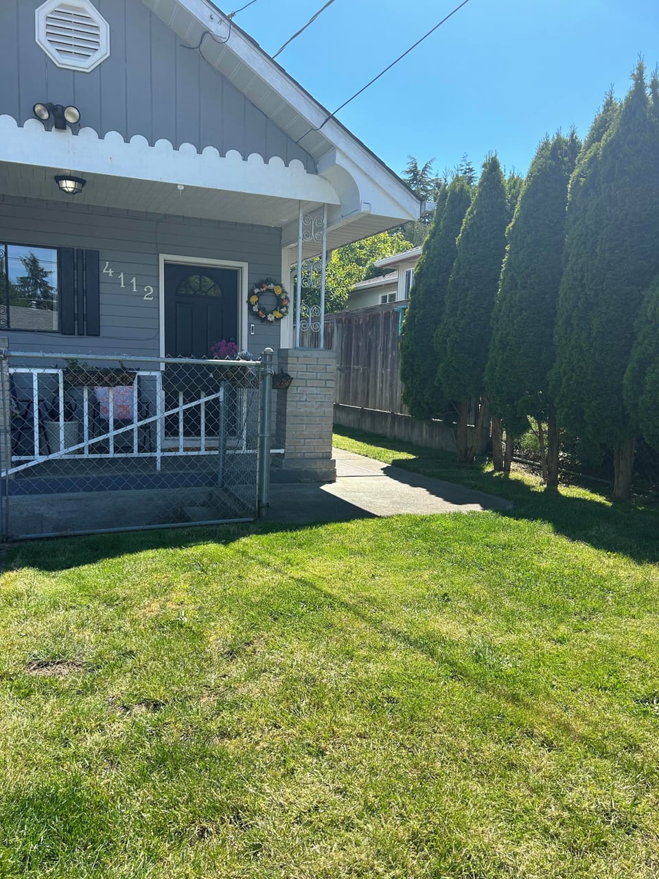 Front yard, fully fenced.