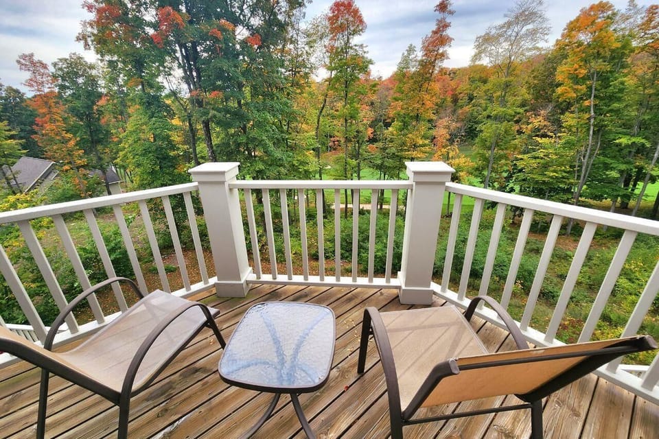 Primary suite private balcony overlooking golf course