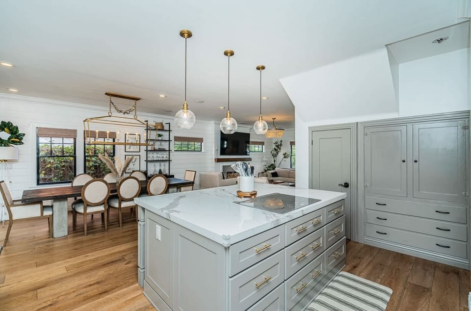 Ample drawer and pantry space for your snacks and other goodies. We have plenty of cleaning supplies stocked for you in the left pantry closet.