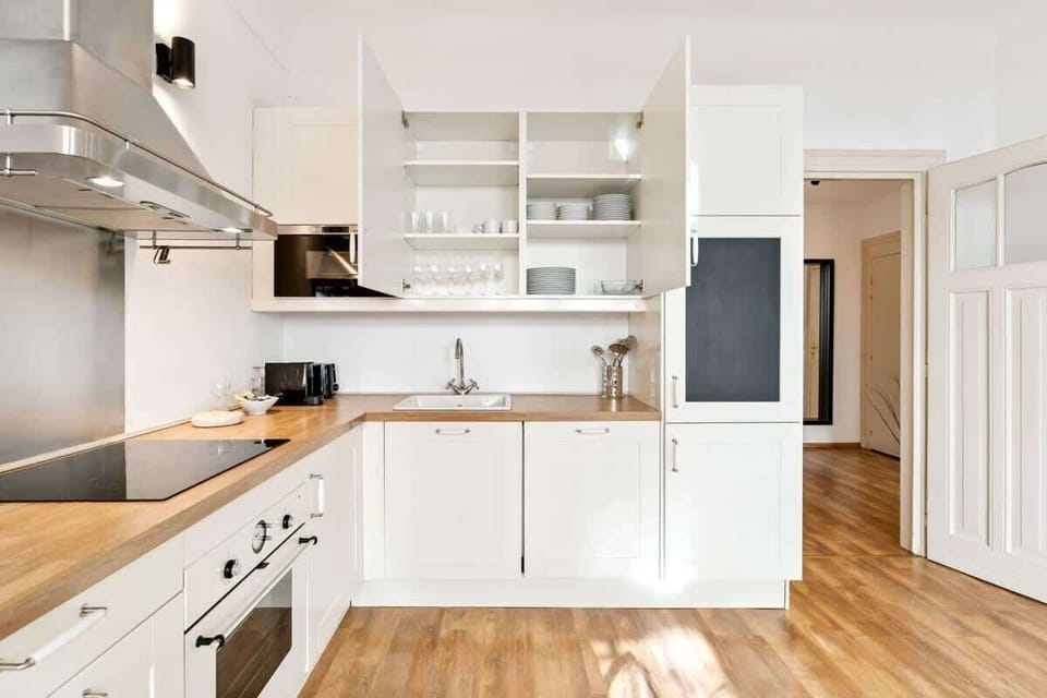 Sleek cabinets and gleaming countertops: your kitchen haven.