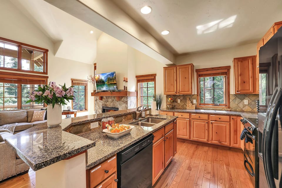 The fully-equipped kitchen at Alpine Escape invites you to unleash your inner chef, complete with modern appliances and ample counter space for meal preparation