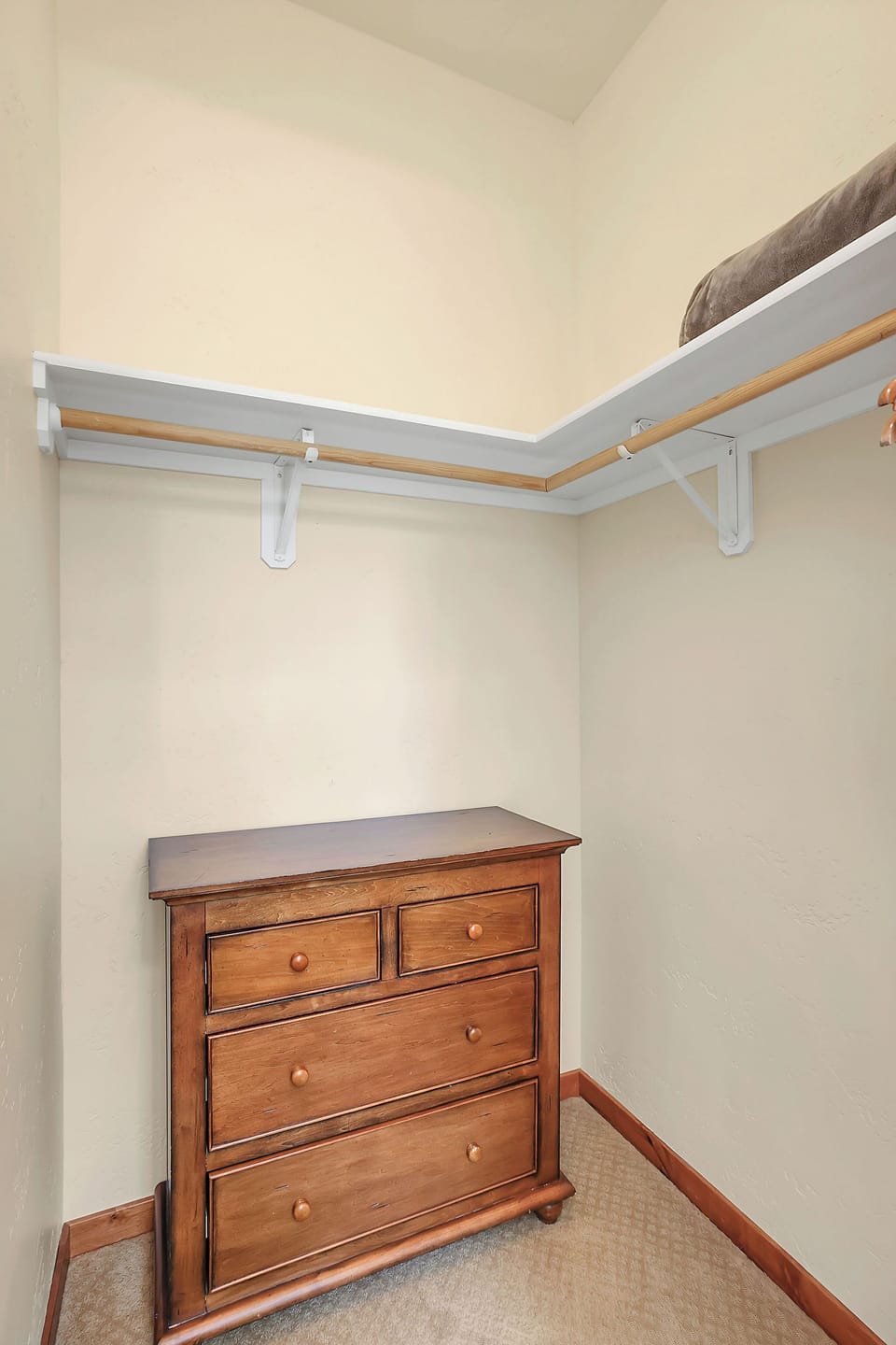 Convenience Meets Style: A spacious walk-in closet in the primary suite provides ample storage, keeping your belongings organized and the space clutter-free