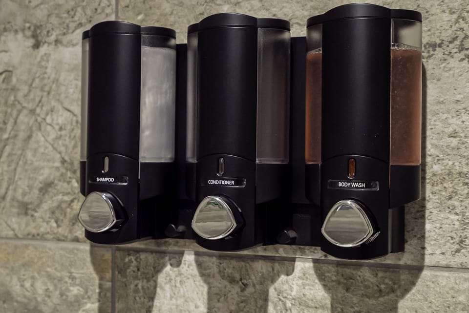 Convenient bathroom dispenser, providing easy access to toiletries and keeping your space tidy and organized.