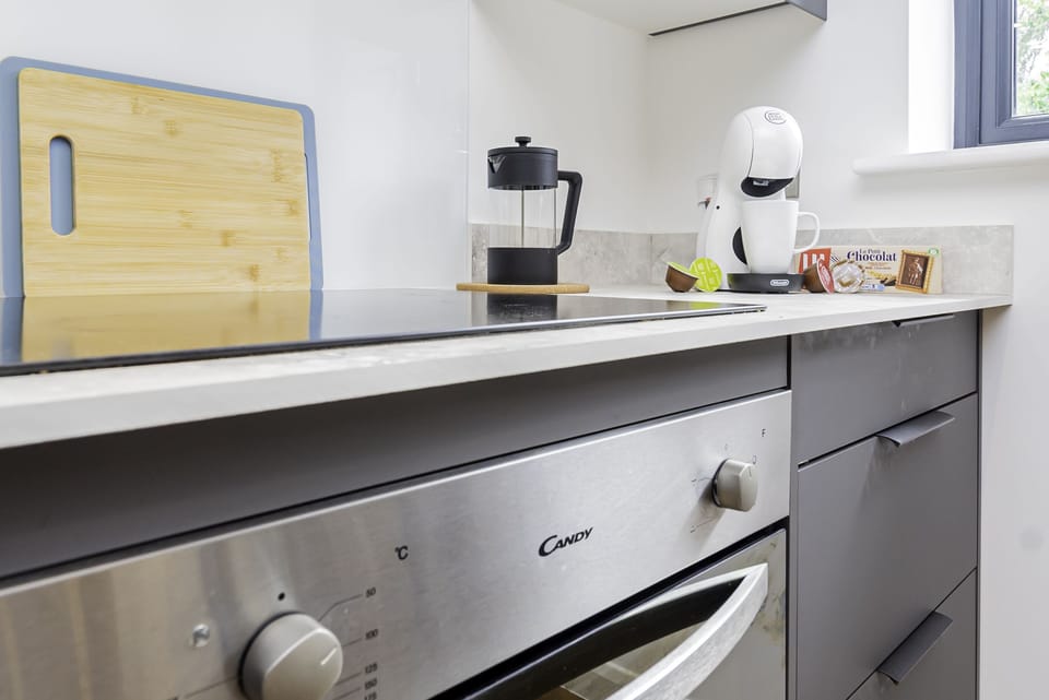Modern kitchen with all the essentials, ready for you to cook, dine, and feel at home during your stay.