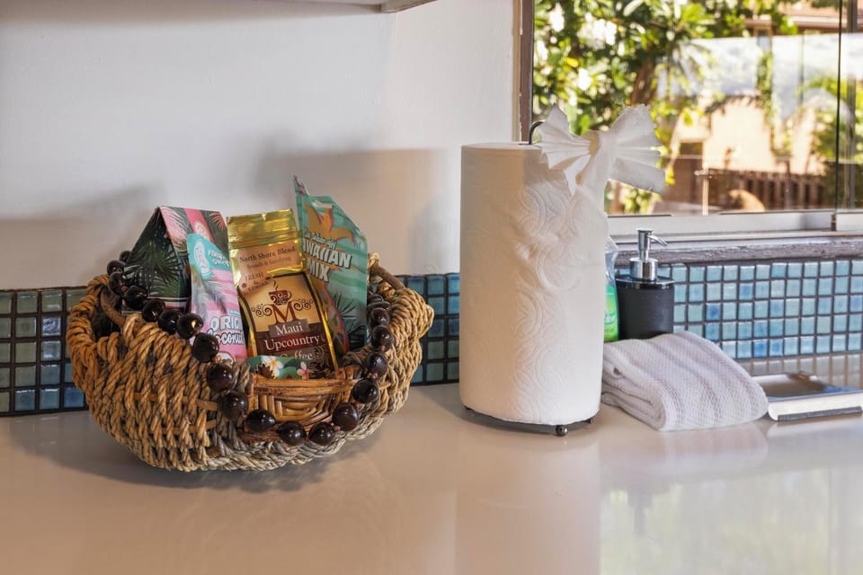Experience a warm welcome with a curated basket of local treats, a perfect touch for guests arriving at this Hawaiian oasis.