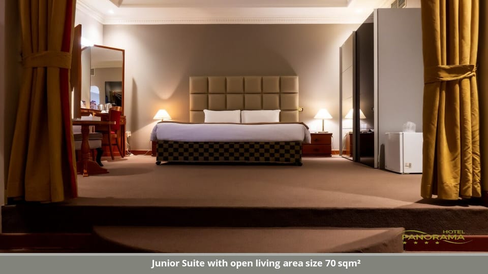 Junior Suite | Desk, blackout drapes, soundproofing, iron/ironing board (on request)