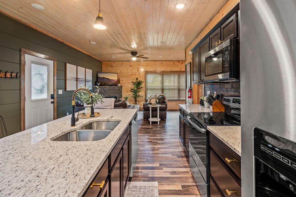 Gourmet Kitchen: Craft delectable meals in our high-end kitchen. Local Fact: Gatlinburg hosts the popular Smoky Mountain Winefest every year.