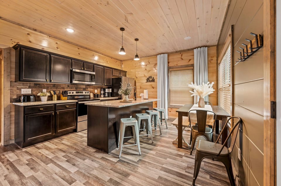 Dining Area: Savor delightful meals in our chic dining area. Local Fact: The Smoky Mountain area is renowned for its traditional bluegrass music.