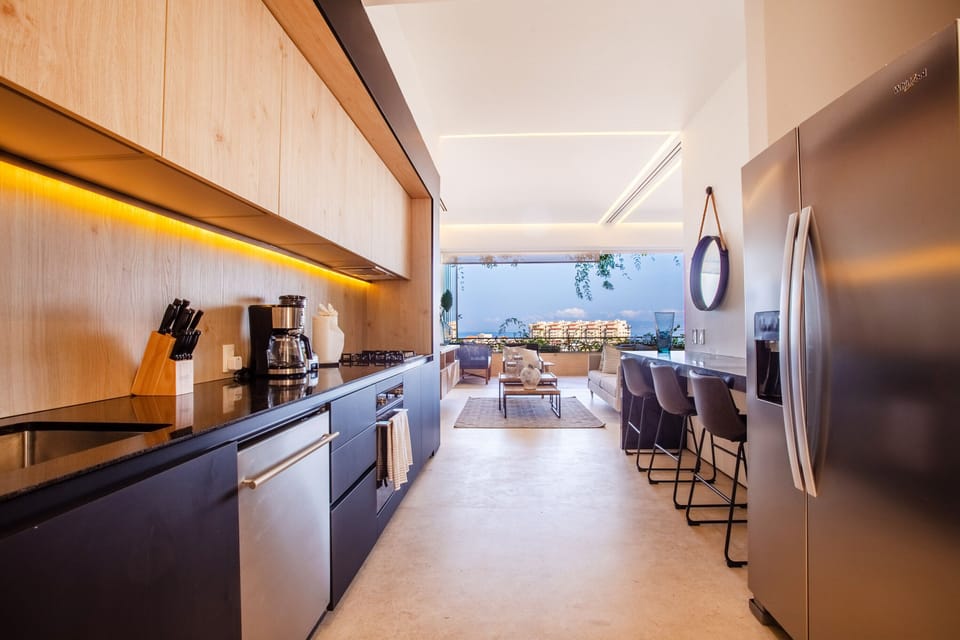 Sleek and fully-equipped kitchen with view