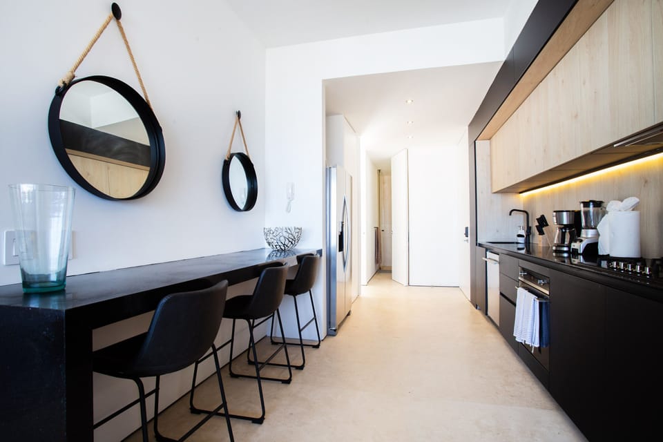 Kitchen amenities include a full-size fridge, stove, oven and dishwasher