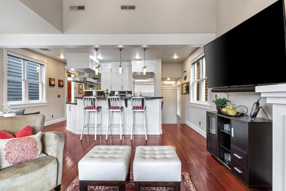 Clean lines, granite counters, and stainless steel elevate this fully equipped kitchen.

