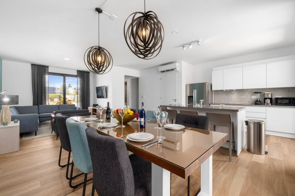 With its open concept layout design,  You can socialize with your guest from the living room to the dining-kitchen area.