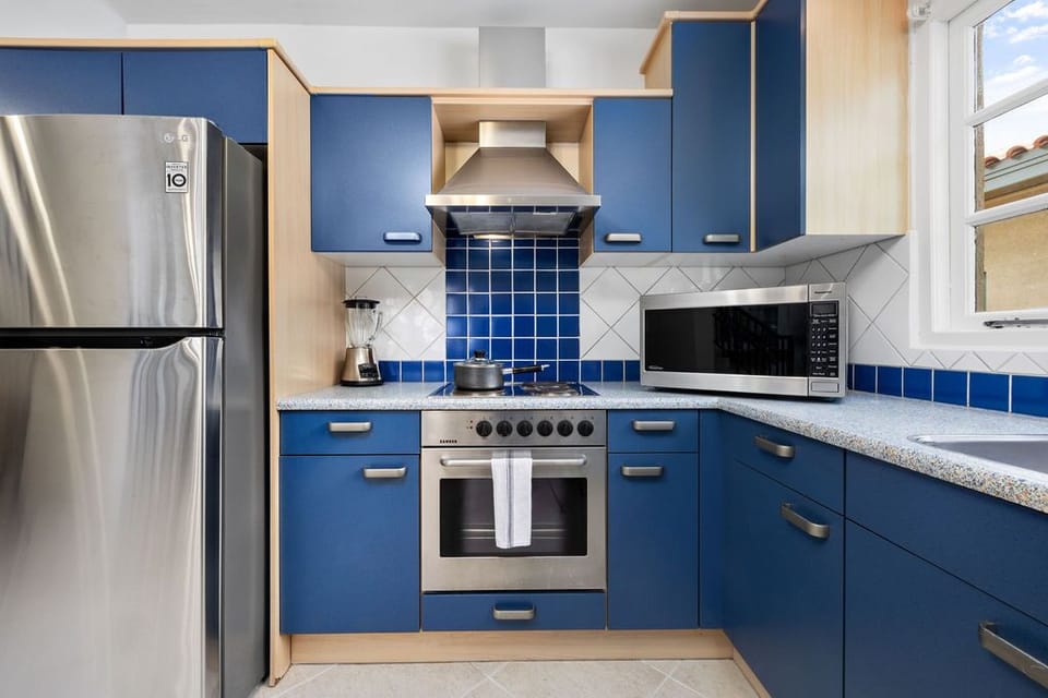 Fully equipped with modern appliances, our kitchen has everything you need to whip up meals or snacks before a day at the beach. Enjoy the convenience of cooking on vacation.