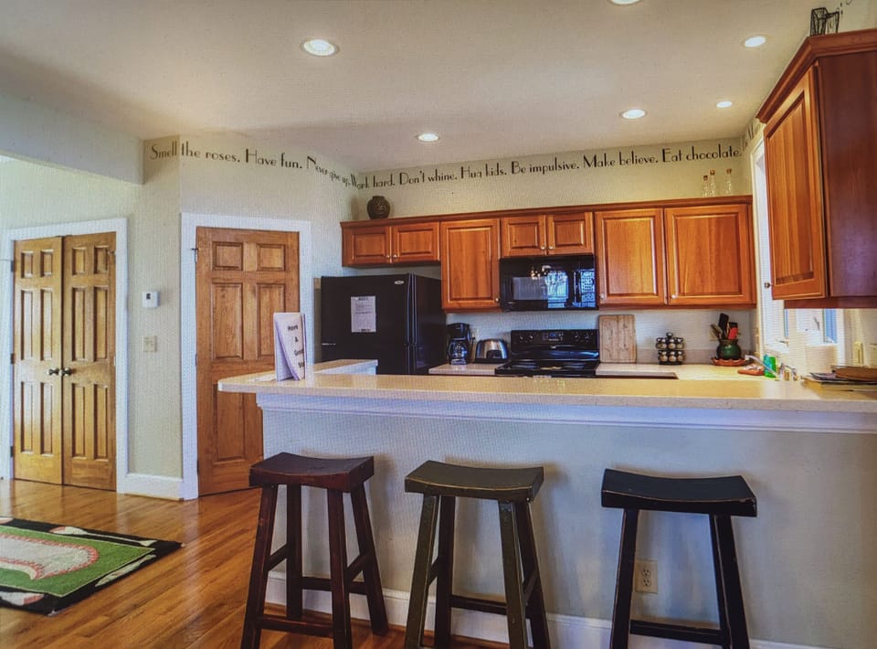 View from Living Room. Full Pantry and Full Size W/D area