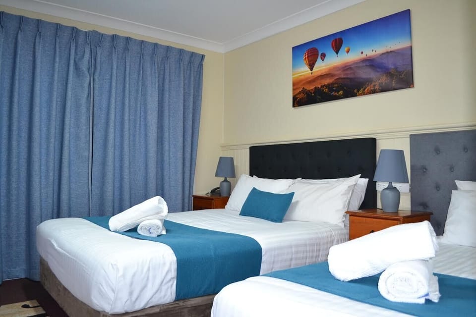 Deluxe Double or Twin Room | Iron/ironing board, WiFi (free), bed sheets