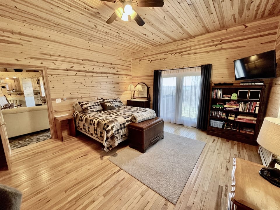 Master bedroom-king bed, TV, space for roll-away beds