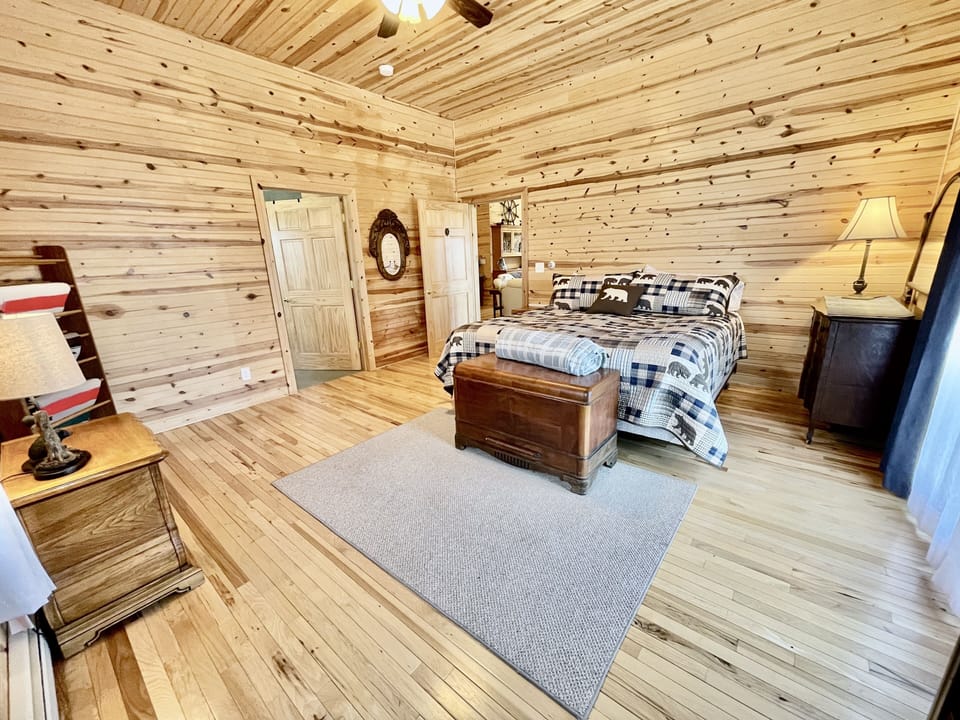 Master bedroom-king bed, TV, space for roll-away beds