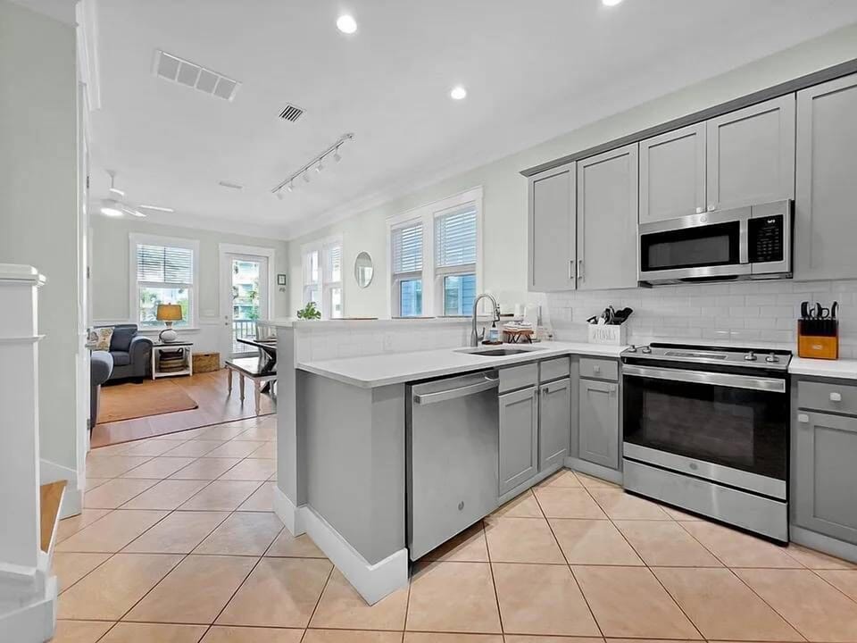 Open floor plan and tall ceilings make the home bright and feel spacious.