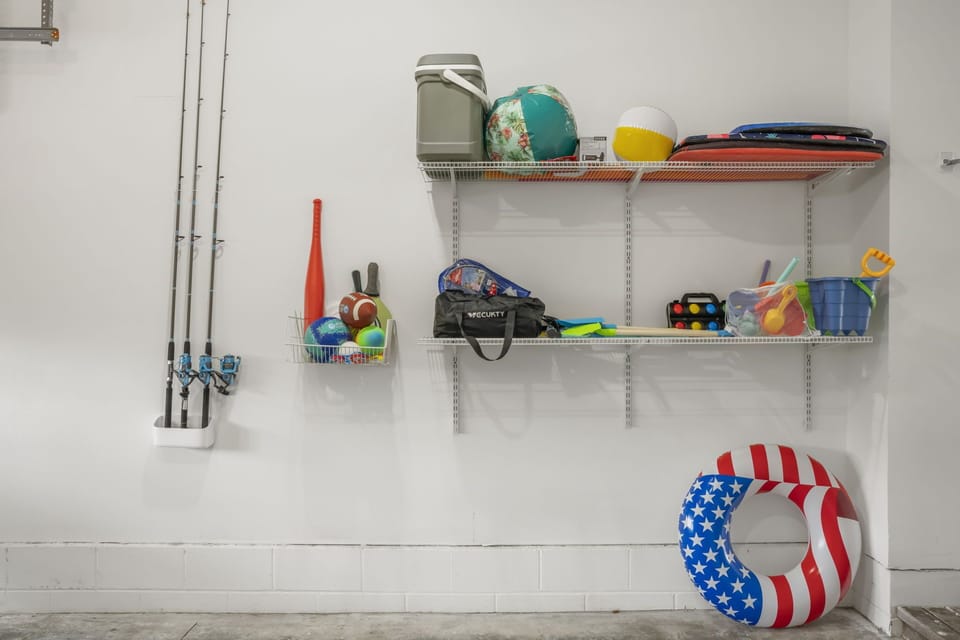 Garage big enough for 1 vehicle and beach toys galore