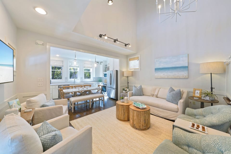 LARGE SOFA, FOUR CLUB CHAIRS, VAULTED CEILINGS