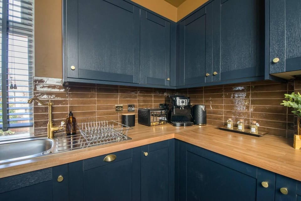 Villa | Private kitchen | Fridge, microwave, oven, stovetop