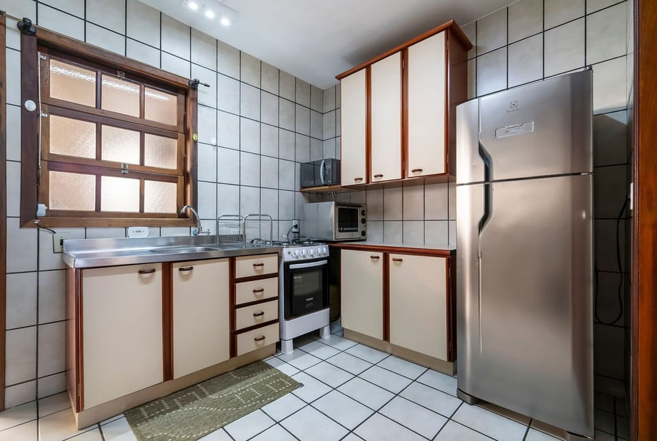 Villa | Private kitchen | Fridge, microwave, oven, blender