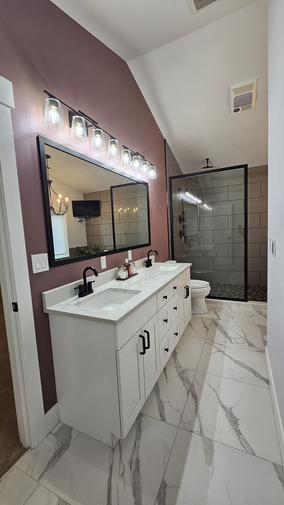 Double sinks-master bath. Large shower w/ rain shower head & regular shower head
