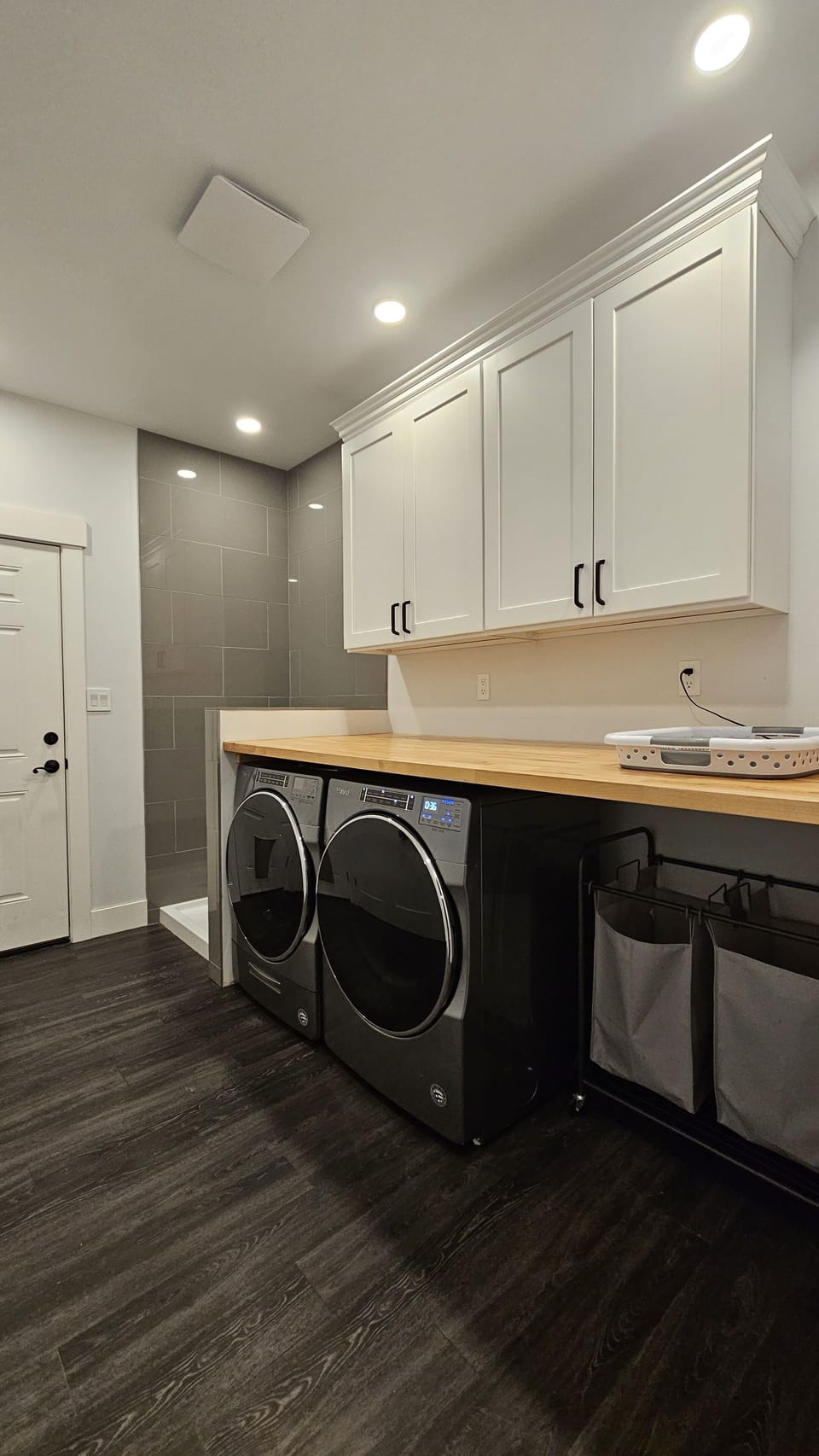 Main floor laundry room and shower