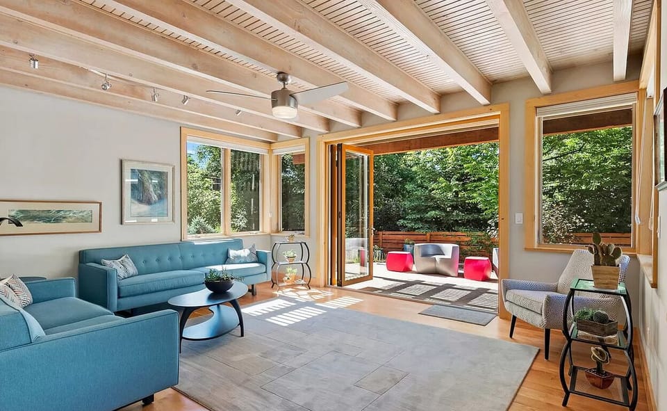 Beautiful living room with french doors which open to a garden.