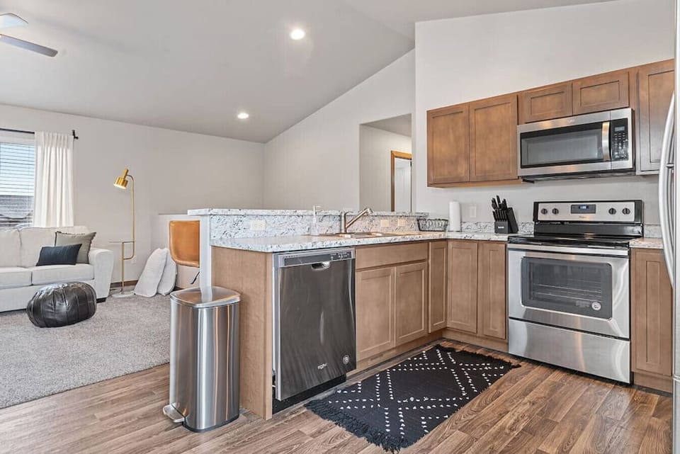 Well-stocked kitchen equipped with all the essentials for culinary enthusiasts and home cooks.