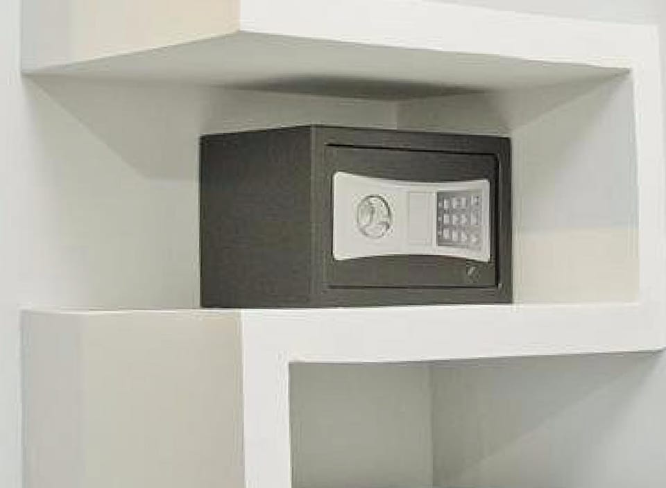 Premium bedding, down comforters, free minibar items, in-room safe
