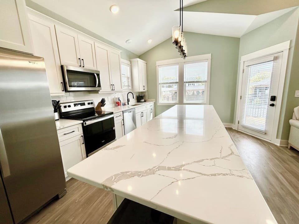 Spacious island provides extra prep and dining space.