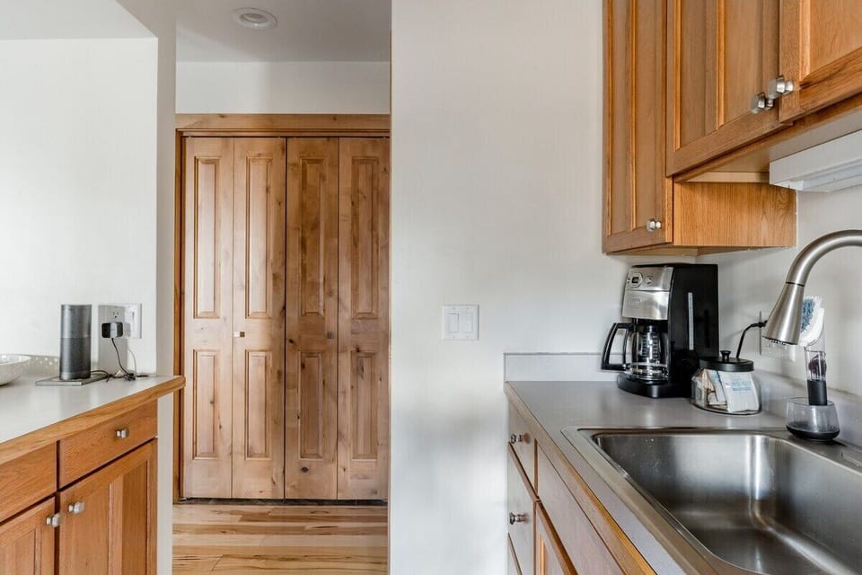 Well stocked kitchen includes coffee maker and all the essentials to enjoy meals