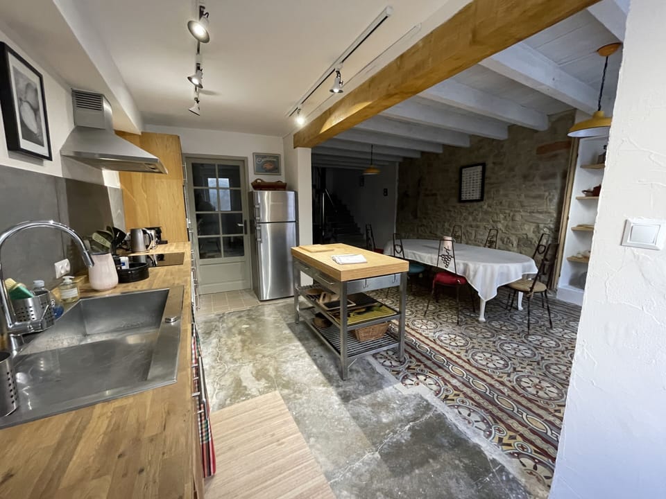 The kitchen and living room from the hall