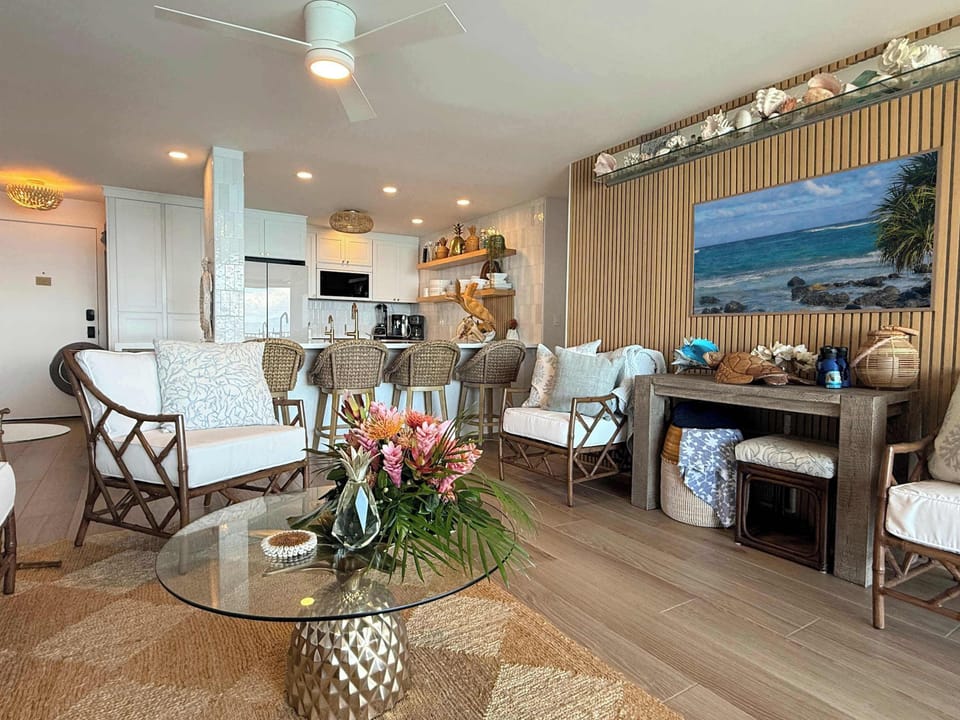 Living Room with the kitchen in the background.