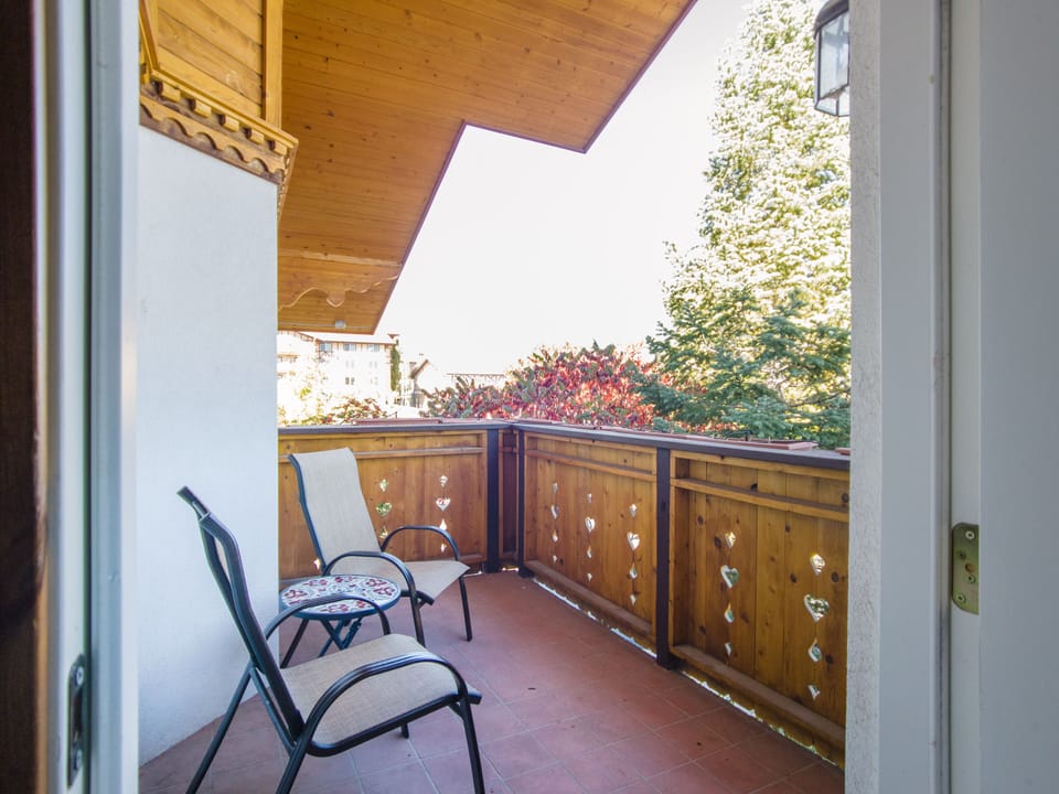 This spacious private deck is off of the master bedroom,  This idyllic space boasts uniquely crafted Swiss inspired woodwork. Great for enjoying a cup of coffee and appreciating the crisp mountain air while appreciating all that nature offers.